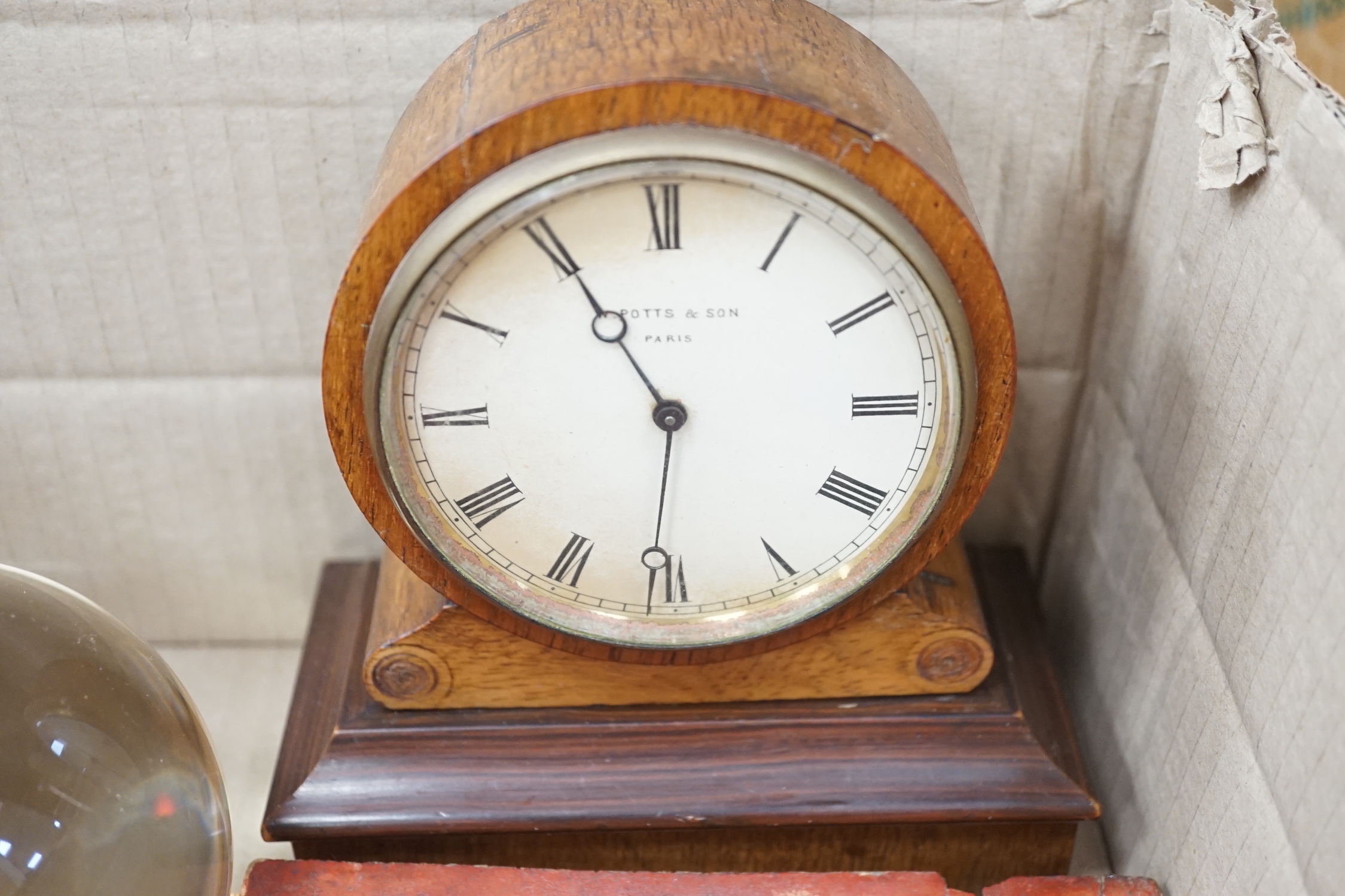 Miscellaneous items comprising a clock, a Moroccan dagger, two Chinese carvings and a crystal ball on stand